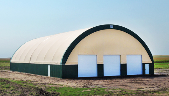 Furnish and install fabric building - hoop barn construction